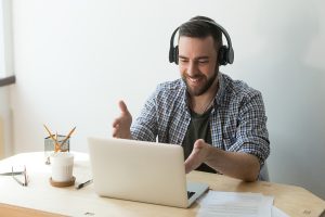 man participating in a webinar